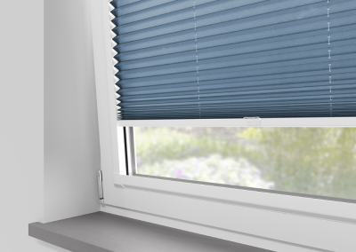Blue window blinds partially closed